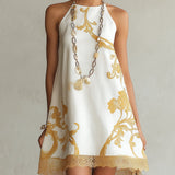 Héloïse - robe mini blanche à motifs dorés pour femme