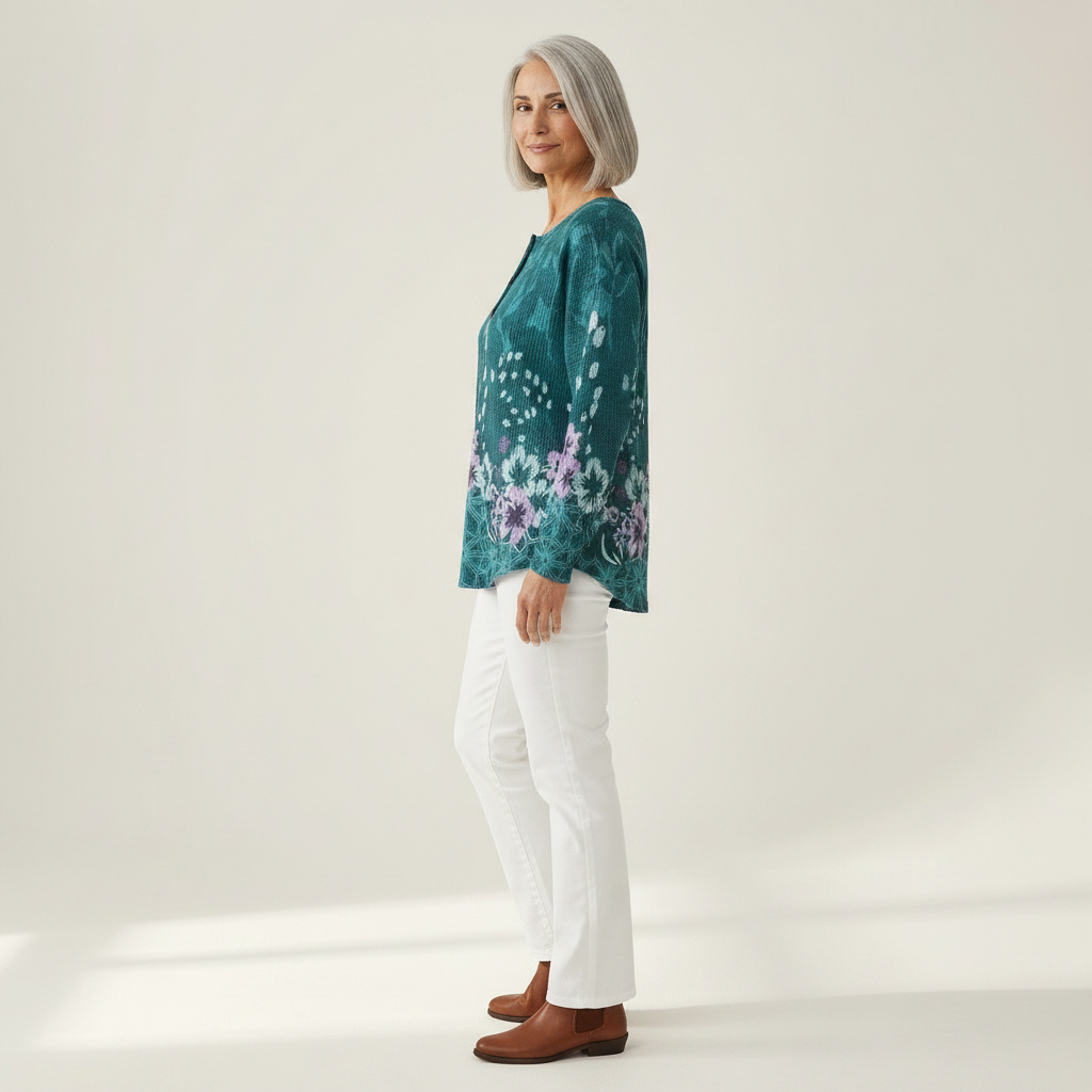Yolande - Pull turquoise à fleurs - détail du tissu