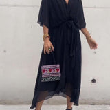 Robe Femme Cristi – Élégante Robe Portefeuille avec Manches Chauve-Souris & Ourlet Asymétrique