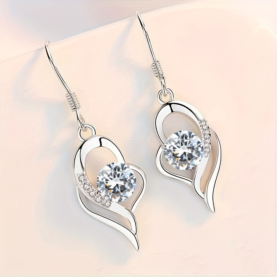Eterna, boucles d'oreilles pendantes en forme de cœur - en situation