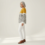 Liv - Pull jaune moutarde à pois - détail du tissu
