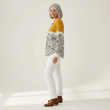 Liv - Pull jaune moutarde à pois - détail du tissu