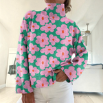 Lucienne - Pull à col roulé rose à motif floral