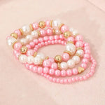Perola, bracelet de perles roses et dorées - en situation