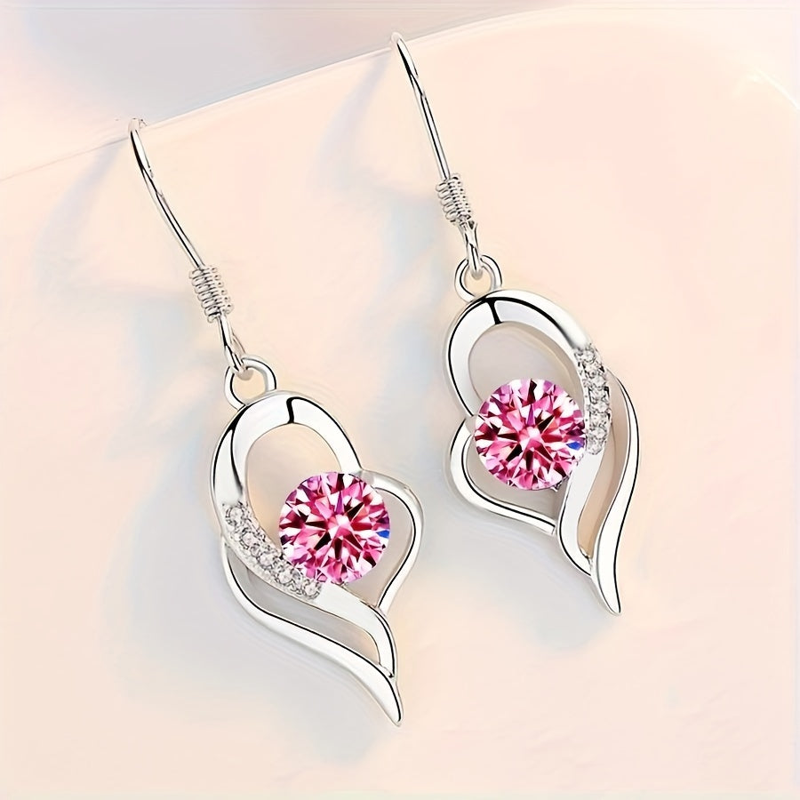 Eterna, boucles d'oreilles pendantes en forme de cœur - vue rapprochée