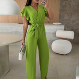 Rochelle Combinaison Femme – Élégante Combinaison Unie avec Décolleté en V, Ceinture & Jambes Amples à Volants