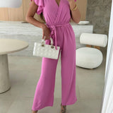 Rochelle Combinaison Femme – Élégante Combinaison Unie avec Décolleté en V, Ceinture & Jambes Amples à Volants