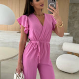 Rochelle Combinaison Femme – Élégante Combinaison Unie avec Décolleté en V, Ceinture & Jambes Amples à Volants