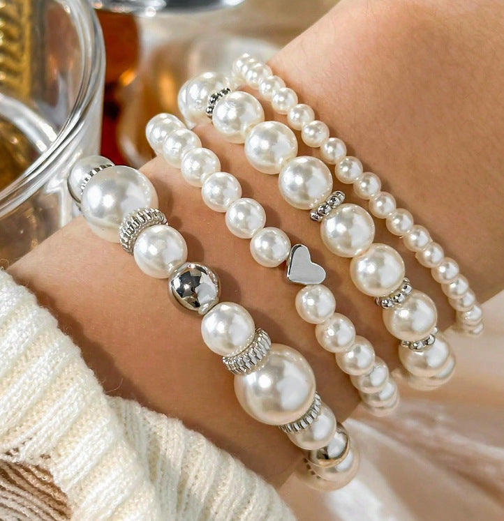 Perola, bracelet de perles roses et dorées - sur fond clair
