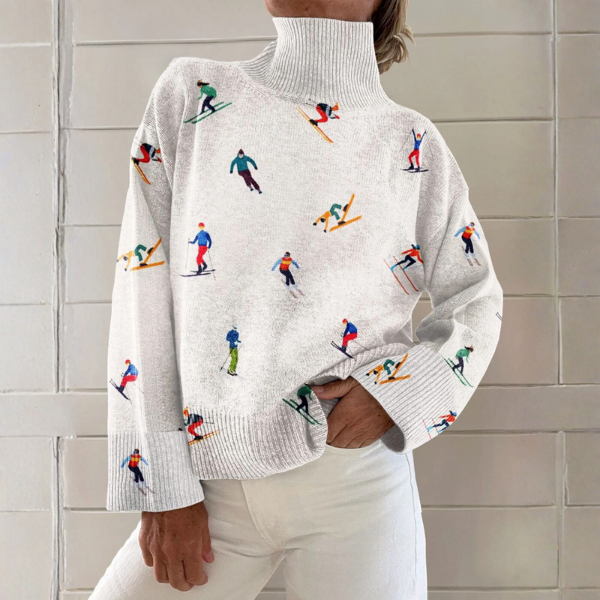 Caroline - Pull à col roulé blanc à motif de skieurs