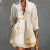 Aliénor - robe mini en dentelle crochetée ivoire à motifs dorés pour femme