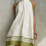 Agathe - robe mini trapèze blanche et vert olive à fleurs pour femme