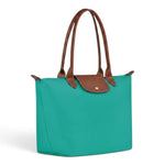 Oriane - Grand cabas pliable en turquoise - vue rapprochée