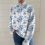 Sarah - Pull à col roulé blanc et bleu à motif floral