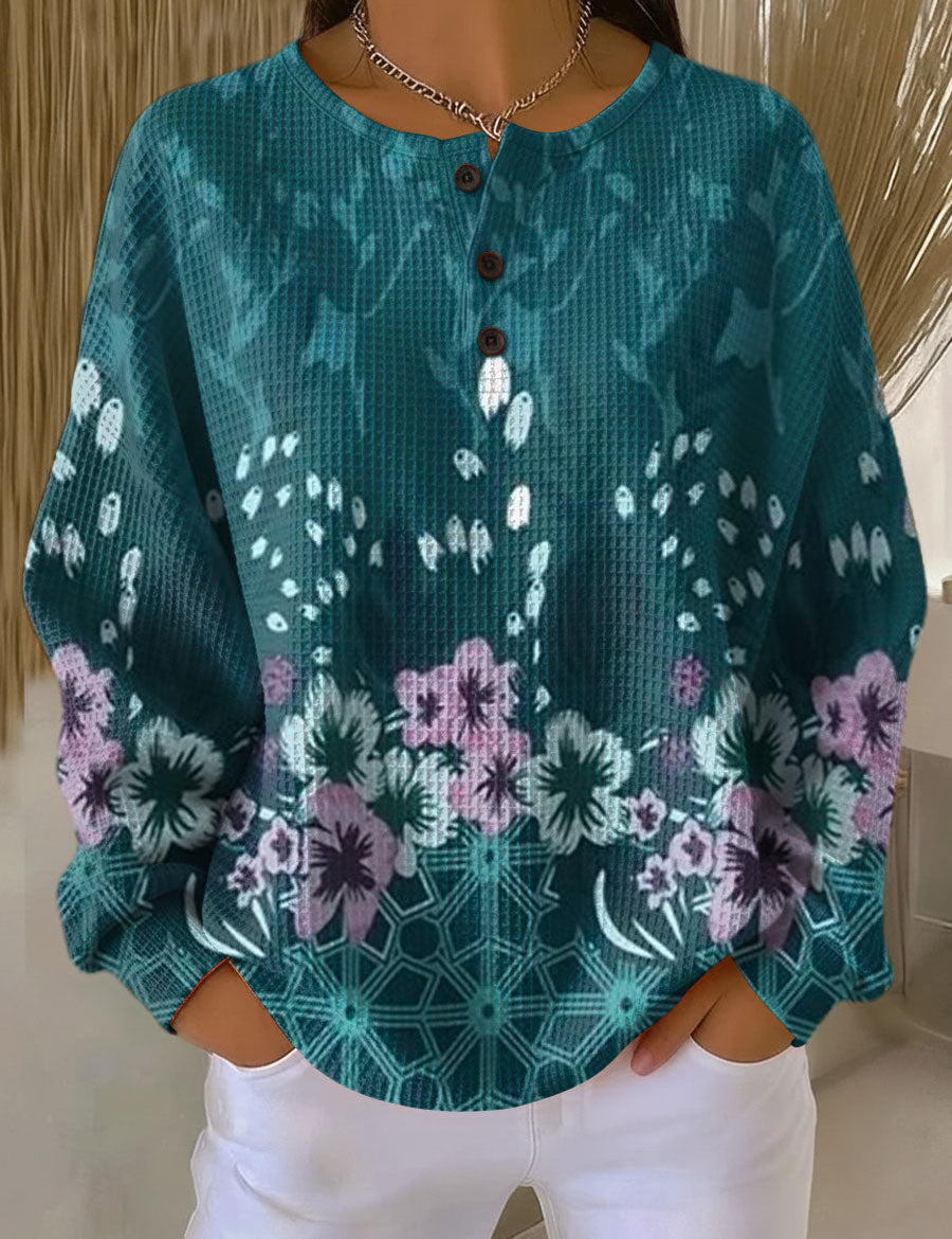 Yolande - Pull turquoise à fleurs - vue d'ensemble