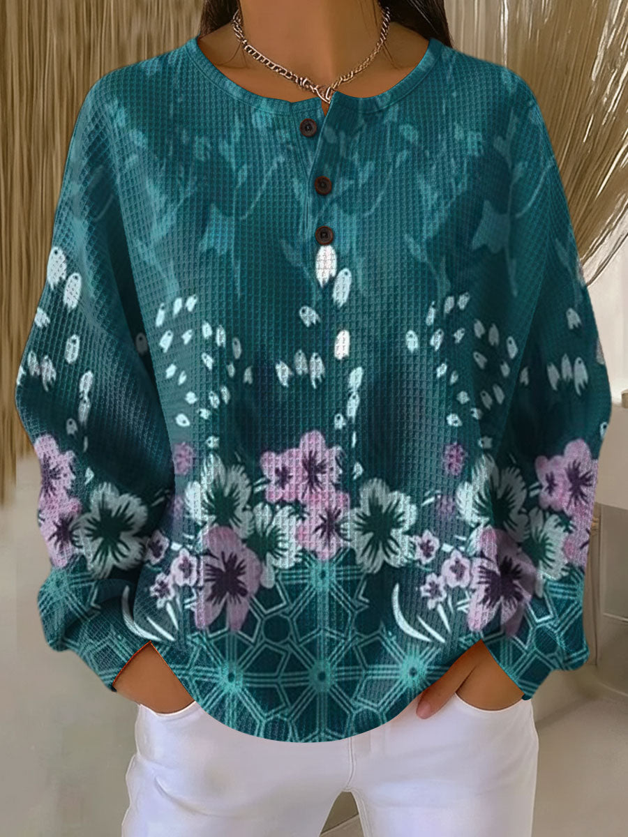 Yolande - Pull turquoise à fleurs - vue d'ensemble